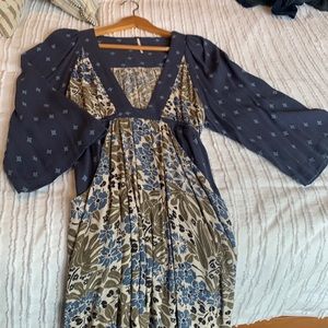 Free people dress- gray-blue, olive and cream colors along with front pockets.